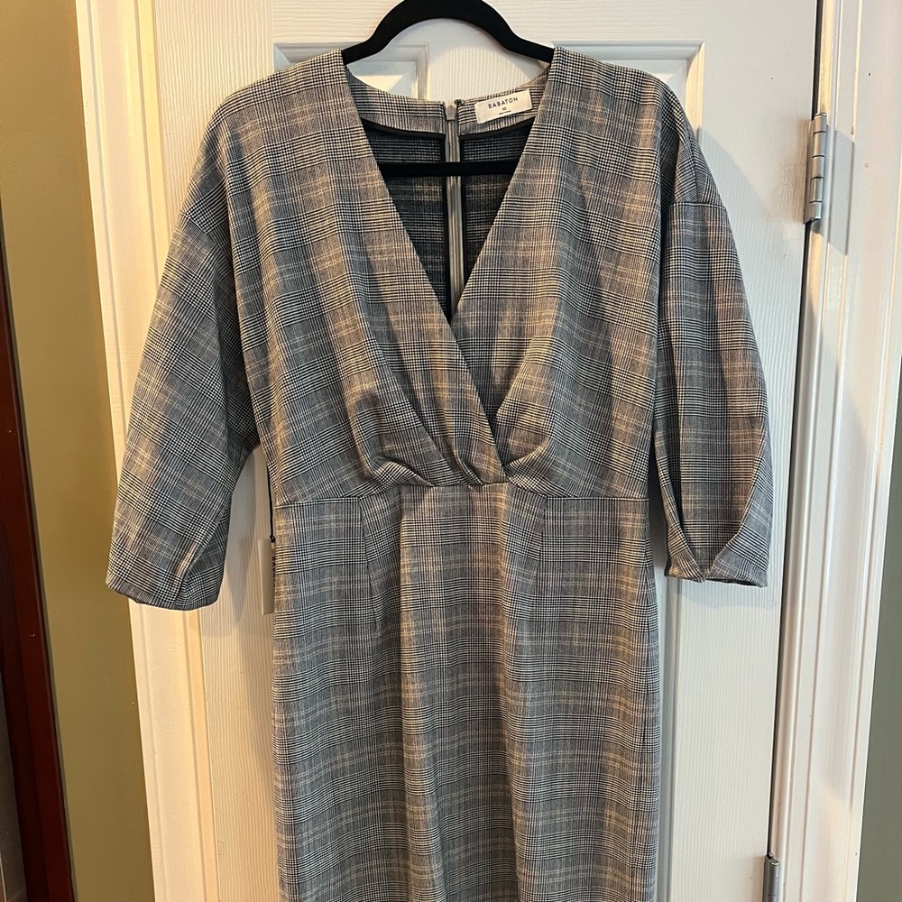 This dress can be worn to the office or out to a party